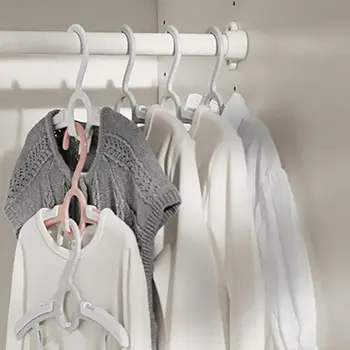 Решение за съхранение на дрехи за малки деца Спестяващи място неплъзгащи се закачалки за бебешки гардероби Разтегателни дрехи за малки деца за дома за новородено Изображение