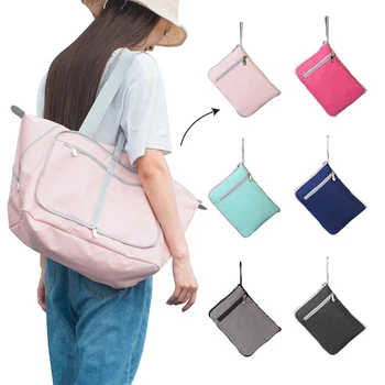 Нова плътен цвят сгъваема пътна чанта Мъже жени преносима чанта за багаж голям капацитет чанта организатор съхранение облекло Duffle чанти Изображение